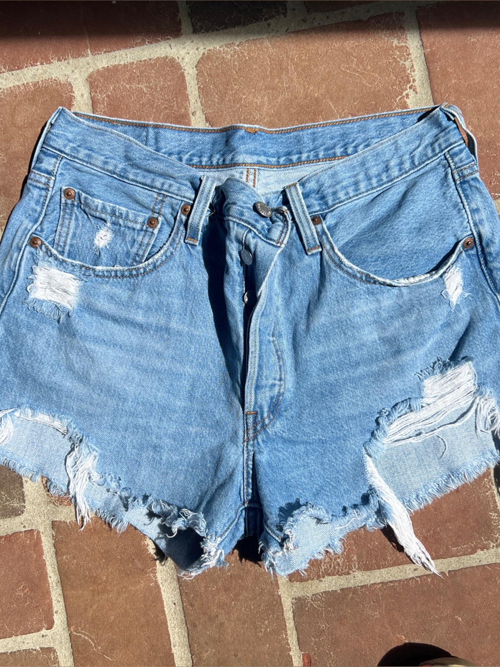 Levi's Light Blue Distressed Denim Shorts